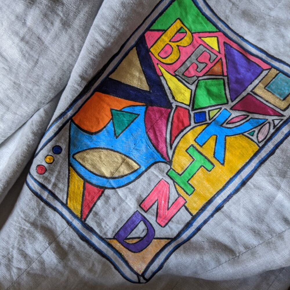 Be Kind, hand-painted linen jacket by Antoinette Jordaine